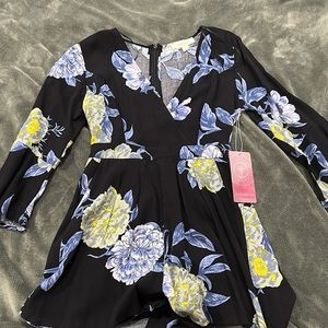 Flowered shorts romper